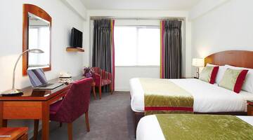 Фото номера Номер с двуспальной и односпальной кроватью Гостевой дом Lancaster Lodge г. Корк 2