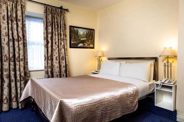 Фото номера Двухместный номер с 1 кроватью Гостевой дом Killarney Guest House г. Корк 25