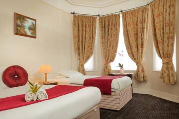 Фото номера Бюджетный трехместный номер Гостевой дом Killarney Guest House г. Корк 3